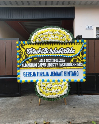 Papan Bunga Duka di Beleka